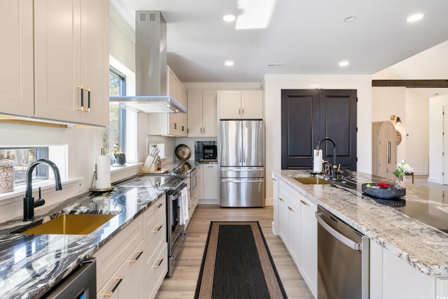 kitchen featuring island exhaust hood, a sink, wine cooler, and stainless steel appliances
