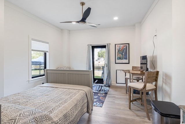 bedroom featuring access to outside, baseboards, recessed lighting, and wood finished floors