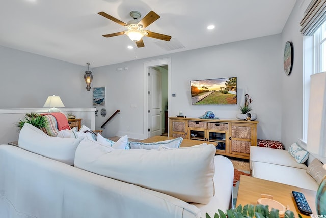 living area with recessed lighting, ceiling fan, and visible vents