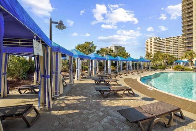 pool with a patio