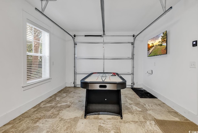 garage featuring baseboards