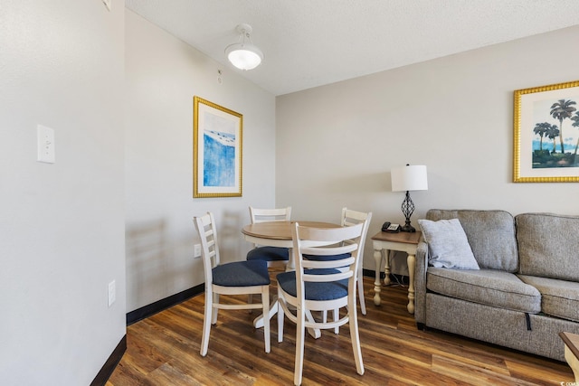 7100 Ocean Blvd N Unit 1425, Myrtle Beach, SC 29572 - dining area with wood finished floors and baseboards