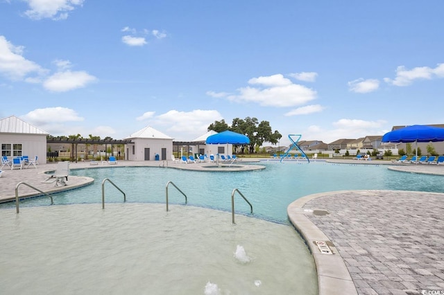 community pool with a patio