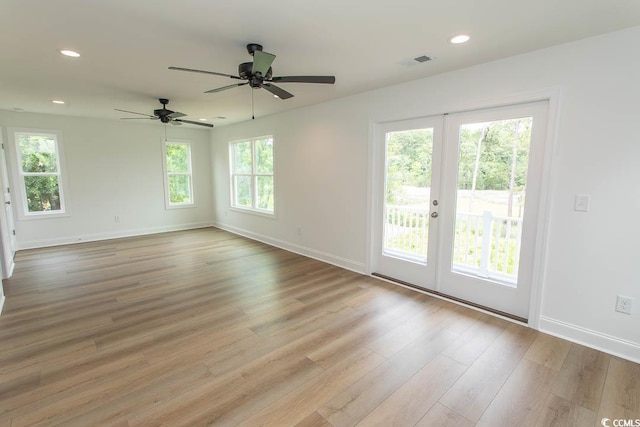 2212 Dykman Cir, Little River, SC 29566 - unfurnished room featuring light wood-style floors, baseboards, french doors, ceiling fan, and recessed lighting