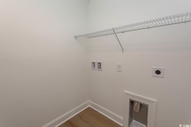 2212 Dykman Cir, Little River, SC 29566 - laundry room featuring hookup for an electric dryer, hookup for a washing machine, baseboards, and dark wood finished floors
