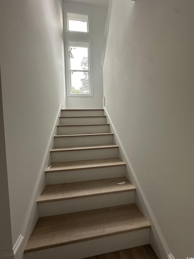 2212 Dykman Cir, Little River, SC 29566 - staircase with baseboards