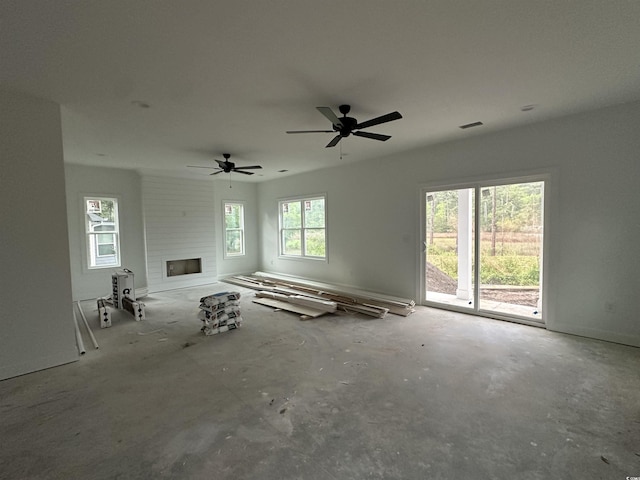2212 Dykman Cir, Little River, SC 29566 - unfurnished living room with a large fireplace