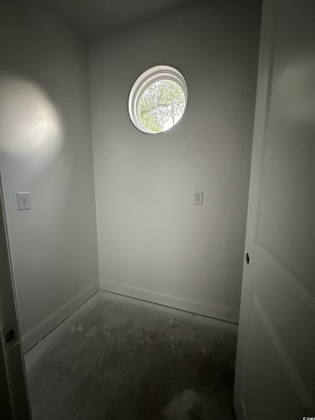 2212 Dykman Cir, Little River, SC 29566 - spare room with baseboards and concrete floors