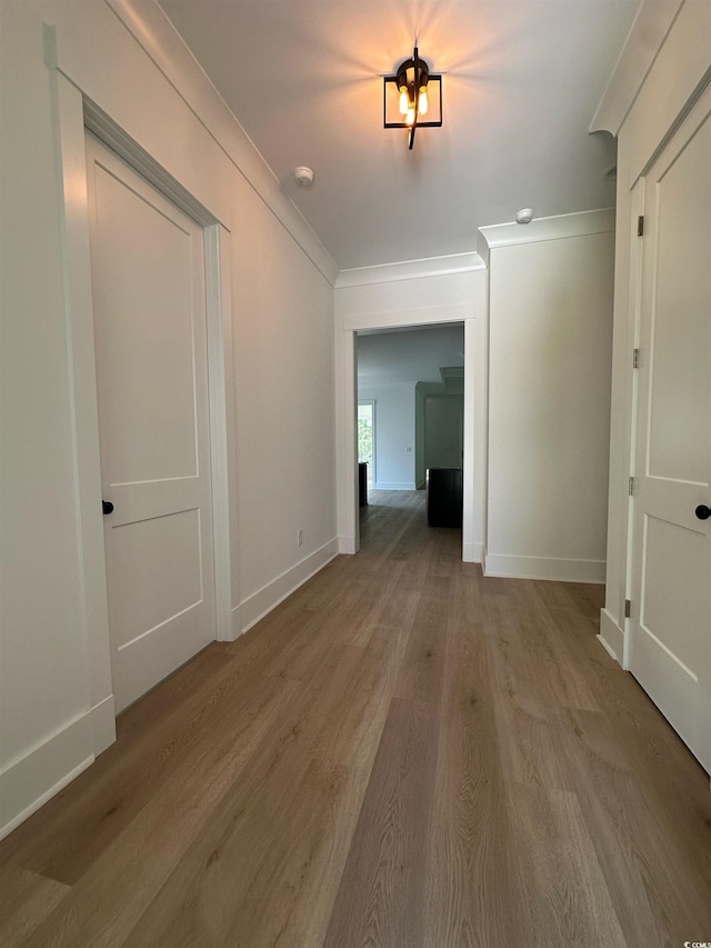 924 Morrall Dr, North Myrtle Beach, SC 29582 - corridor featuring wood finished floors and ornamental molding