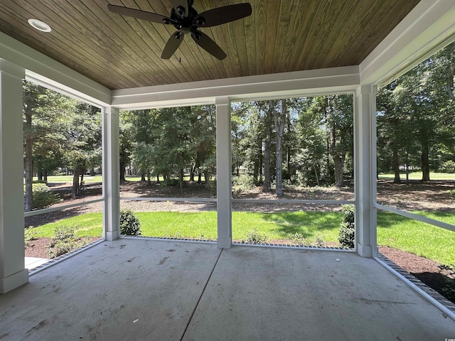 924 Morrall Dr, North Myrtle Beach, SC 29582 - unfurnished sunroom with ceiling fan and view of scattered trees