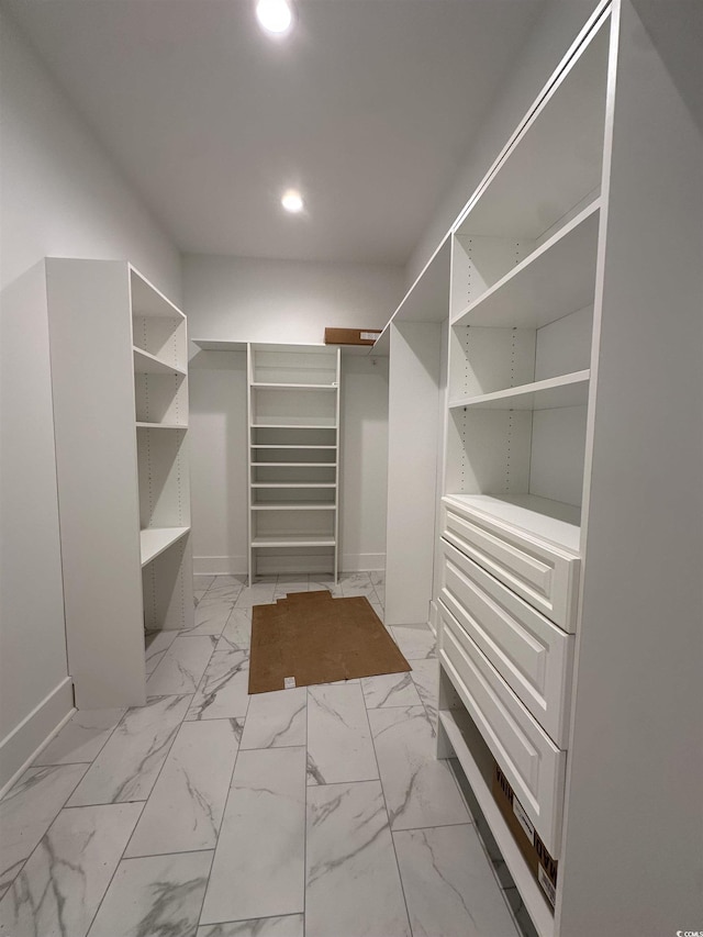924 Morrall Dr, North Myrtle Beach, SC 29582 - spacious closet featuring light marble finish flooring