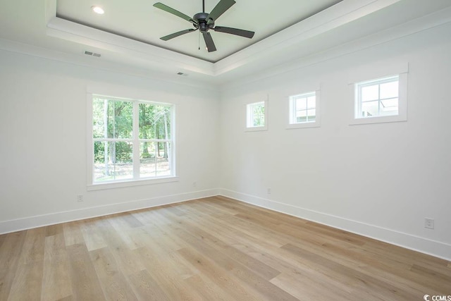 924 Morrall Dr, North Myrtle Beach, SC 29582 - unfurnished room with a tray ceiling, light wood-style flooring, a ceiling fan, and recessed lighting