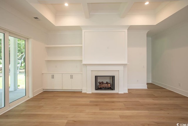924 Morrall Dr, North Myrtle Beach, SC 29582 - unfurnished living room featuring a fireplace, light wood-style floors, recessed lighting, crown molding, and beam ceiling