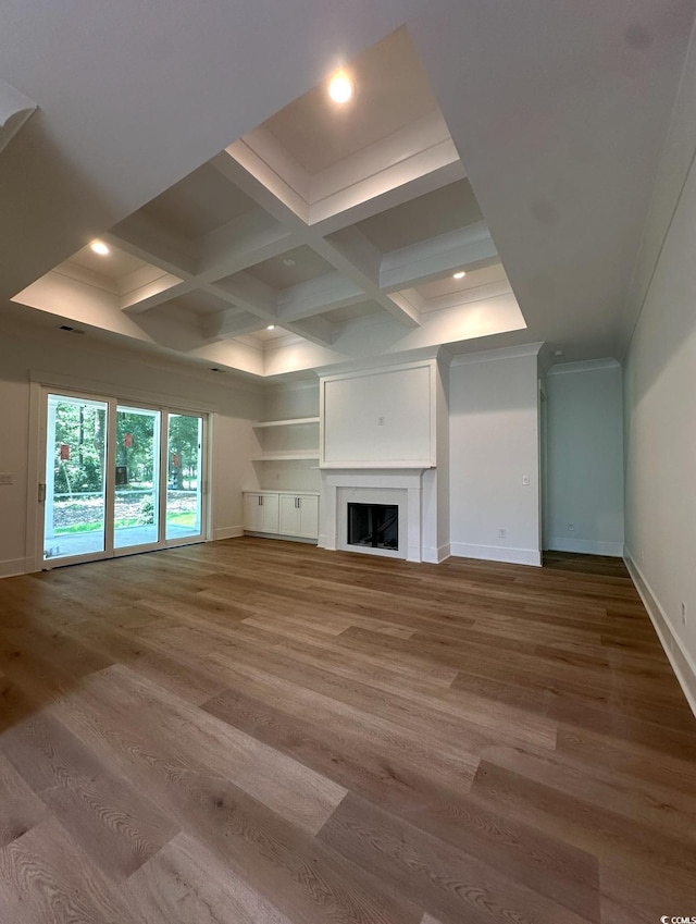 924 Morrall Dr, North Myrtle Beach, SC 29582 - unfurnished living room featuring wood finished floors, coffered ceiling, a fireplace, beam ceiling, and recessed lighting