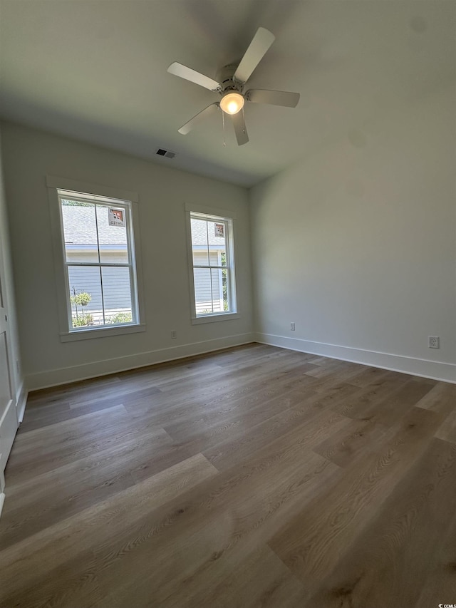 924 Morrall Dr, North Myrtle Beach, SC 29582 - unfurnished room with wood finished floors and a ceiling fan