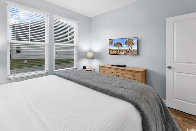 bedroom featuring wood finished floors