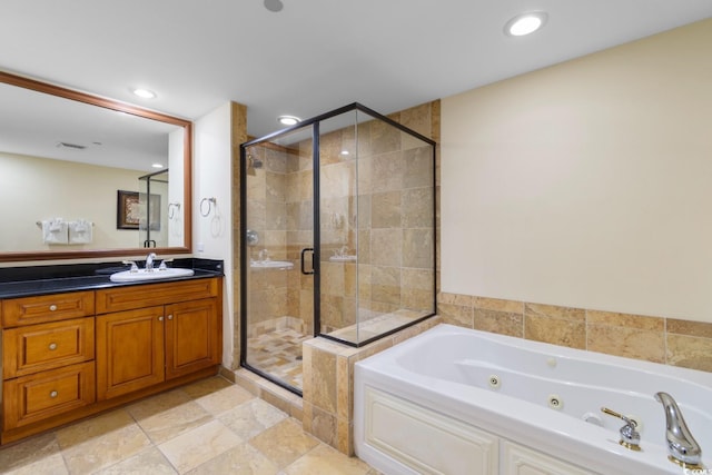 full bath featuring vanity, recessed lighting, a tub with jets, visible vents, and a stall shower