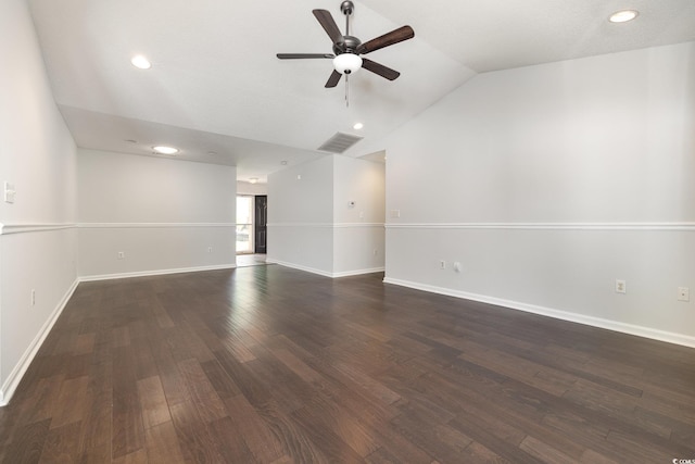 unfurnished room with visible vents, wood finished floors, lofted ceiling, baseboards, and ceiling fan