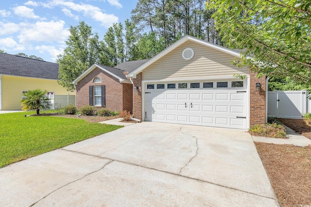 single story home featuring concrete driveway, brick siding, a garage, and a front lawn