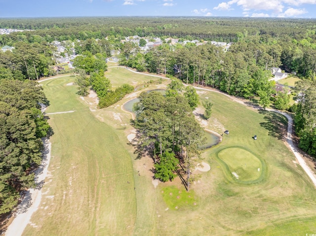aerial view featuring a view of trees and golf course view