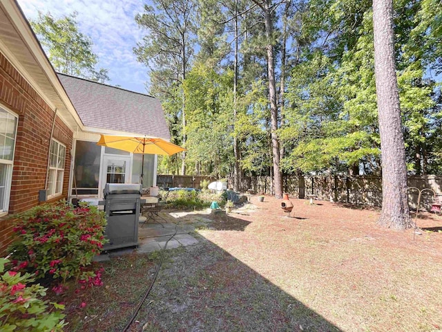 view of yard featuring a patio and a fenced backyard