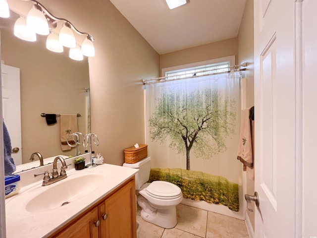 bathroom featuring vanity, tile patterned flooring, toilet, and curtained shower