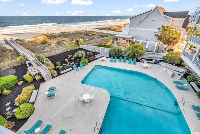 1581 S Waccamaw Dr Unit 302, Garden City Beach, SC 29576 - pool with a view of the beach, a patio area, fence, and a water view