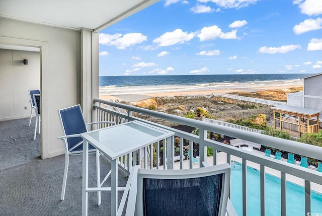 1581 S Waccamaw Dr Unit 302, Garden City Beach, SC 29576 - balcony with a water view and a view of the beach