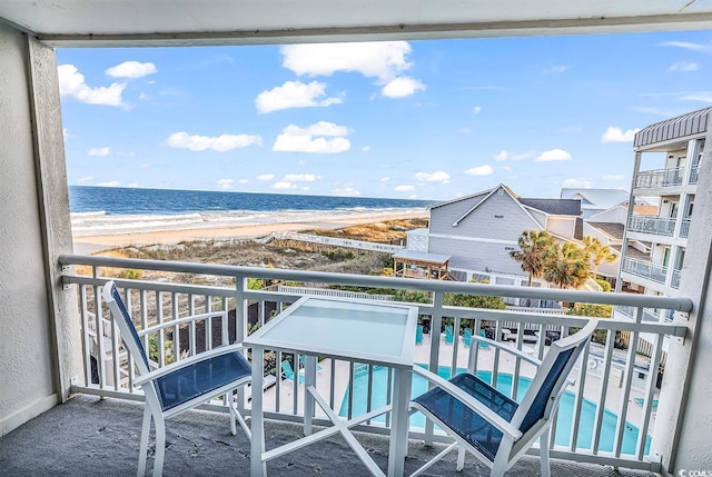 1581 S Waccamaw Dr Unit 302, Garden City Beach, SC 29576 - balcony with a water view and a view of the beach
