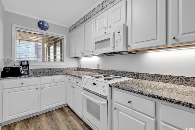 1581 S Waccamaw Dr Unit 302, Garden City Beach, SC 29576 - kitchen featuring crown molding, white cabinets, white appliances, dark stone countertops, and wood finished floors