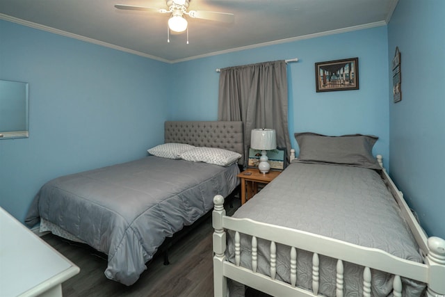 bedroom with ornamental molding, ceiling fan, and wood finished floors