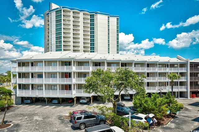 view of property with covered parking