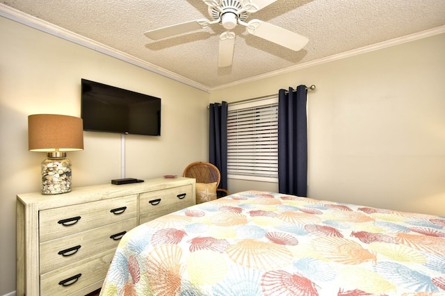bedroom featuring a textured ceiling, ornamental molding, and ceiling fan