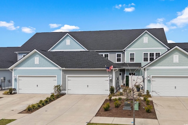view of front of house featuring a garage and concrete driveway