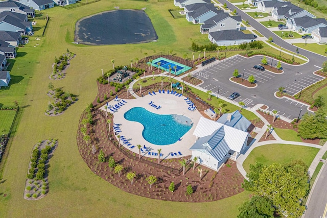 birds eye view of property with a residential view