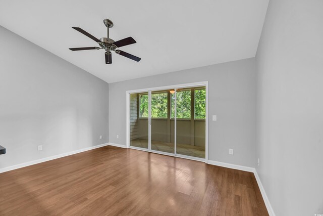 1260 White Tree Ln Unit F, Myrtle Beach, SC 29588 - spare room with baseboards, a ceiling fan, wood finished floors, and lofted ceiling