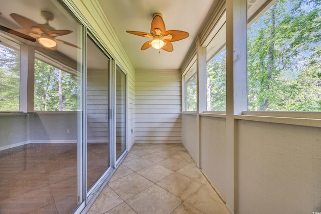 1260 White Tree Ln Unit F, Myrtle Beach, SC 29588 - unfurnished sunroom featuring a ceiling fan and tile patterned flooring