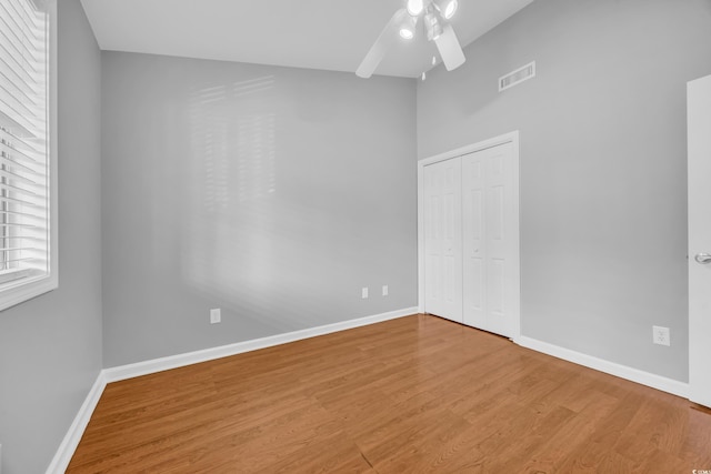1260 White Tree Ln Unit F, Myrtle Beach, SC 29588 - unfurnished bedroom with baseboards, a closet, wood finished floors, and visible vents