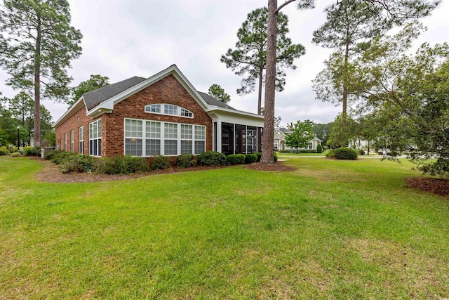 912 Berwick Ln, Myrtle Beach, SC 29579 - back of property featuring brick siding and a lawn