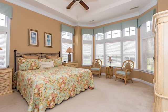 912 Berwick Ln, Myrtle Beach, SC 29579 - bedroom with light carpet, crown molding, a ceiling fan, baseboards, and a raised ceiling