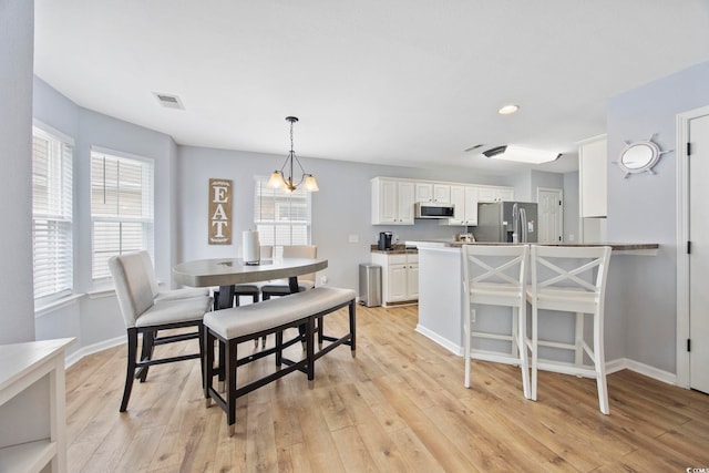 1097 Stoney Falls Blvd, Myrtle Beach, SC 29579 - dining room with light wood-style flooring, baseboards, and recessed lighting