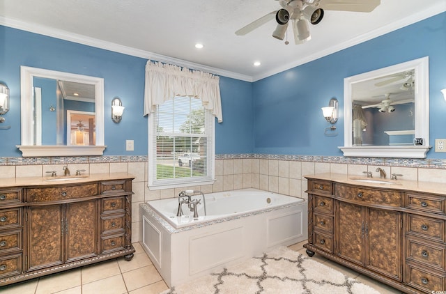 128 Causey St, Myrtle Beach, SC 29577 - bathroom with tile patterned floors, tile walls, a ceiling fan, two vanities, and a bath