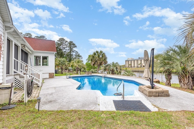 128 Causey St, Myrtle Beach, SC 29577 - swimming pool featuring a sunroom and a patio area