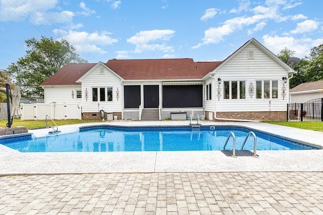 128 Causey St, Myrtle Beach, SC 29577 - view of swimming pool with a gate and a sunroom