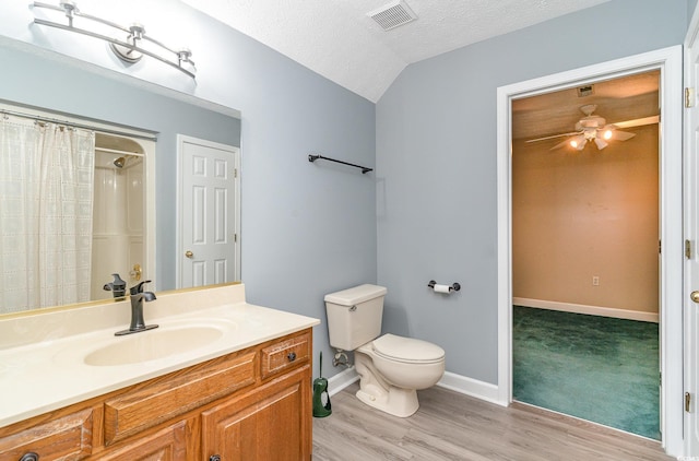 128 Causey St, Myrtle Beach, SC 29577 - full bath featuring toilet, vanity, wood finished floors, ceiling fan, and baseboards