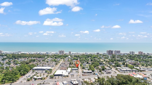 view of urban area with a nearby body of water