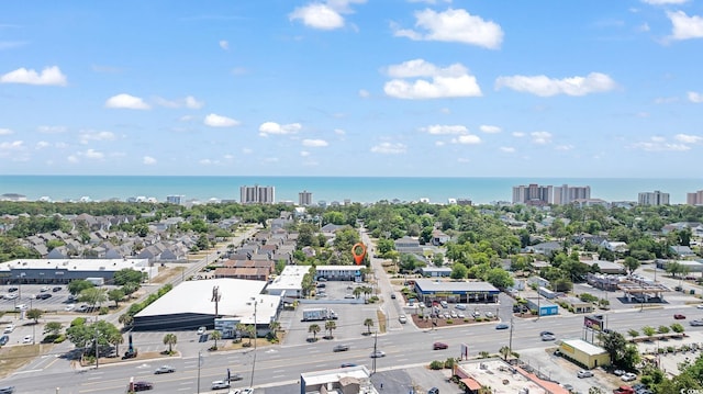 view of urban area with a nearby body of water