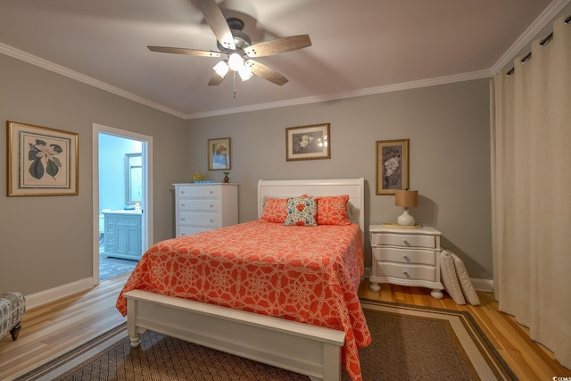 bedroom with ceiling fan, ensuite bathroom, baseboards, ornamental molding, and light wood-style flooring