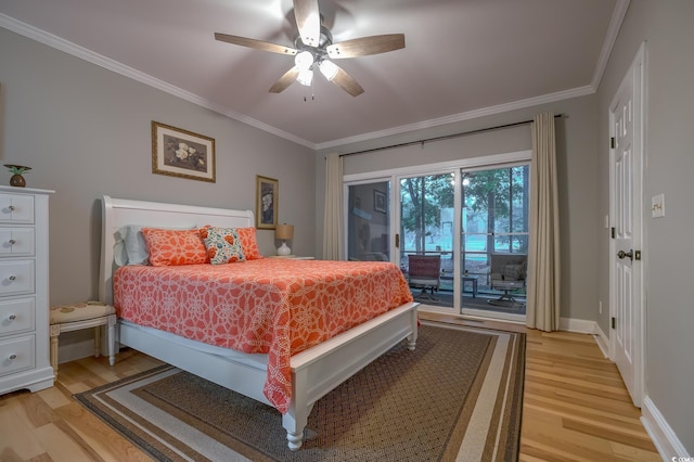 bedroom featuring access to outside, light wood finished floors, crown molding, and baseboards