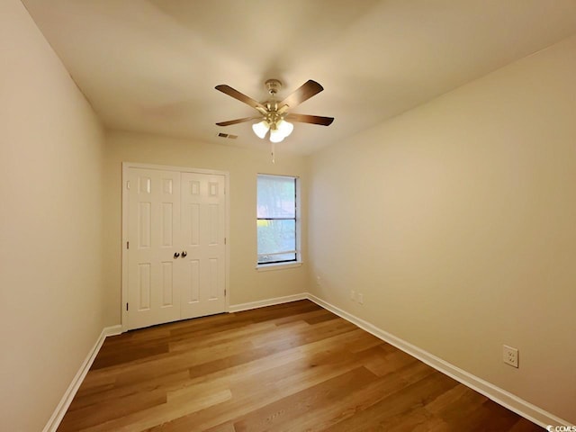 116 Hickory Dr, Conway, SC 29526 - unfurnished room with wood finished floors, baseboards, and ceiling fan